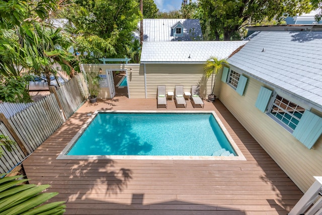 525 Simonton St, Key West, FL 33040 - view of swimming pool featuring a deck and a fenced backyard