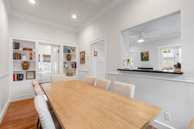 525 Simonton St, Key West, FL 33040 - dining space with crown molding, wood finished floors, ceiling fan, recessed lighting, and built in shelves