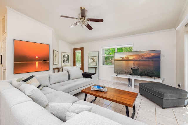 tiled living room featuring vaulted ceiling, ornamental molding, and ceiling fan