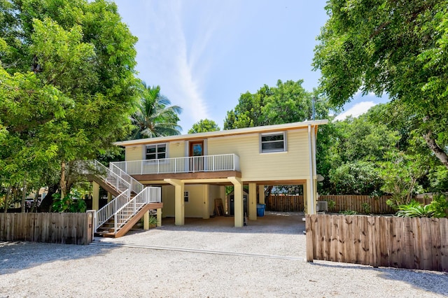 view of front facade with a carport