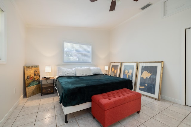 tiled bedroom featuring ceiling fan and ornamental molding