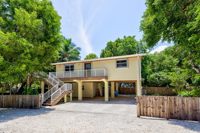 view of front of house with a carport