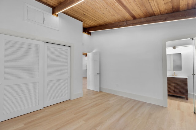 178 Coral Ave, Tavernier, FL 33070 - unfurnished bedroom with a wood ceiling with exposed beams, wood finished floors, and a closet