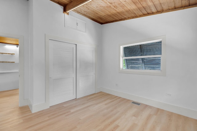 178 Coral Ave, Tavernier, FL 33070 - unfurnished bedroom with wooden ceiling, wood finished floors, and a closet
