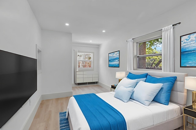 178 Coral Ave, Tavernier, FL 33070 - bedroom featuring multiple windows, light wood finished floors, and recessed lighting