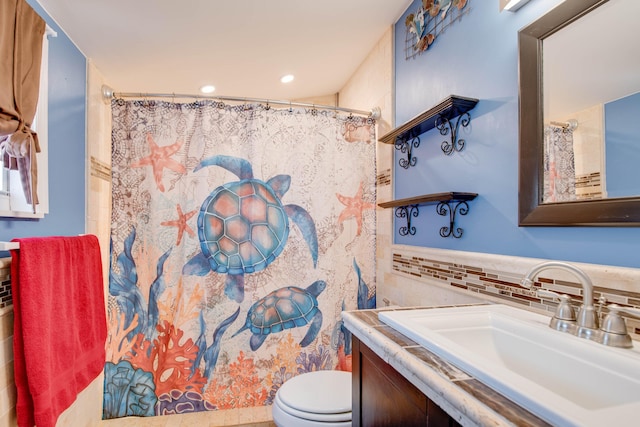 30957 Mercedes Rd, Big Pine, FL 33043 - full bathroom with vanity, tile walls, recessed lighting, wainscoting, and a shower with shower curtain