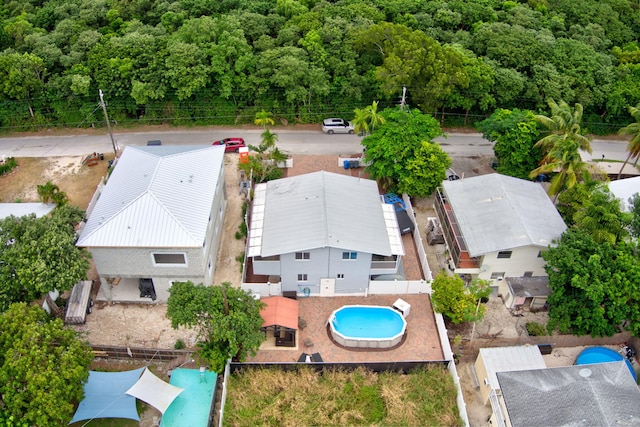 aerial view with a wooded view