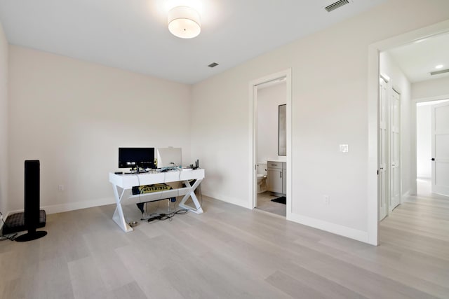 office featuring light hardwood / wood-style floors