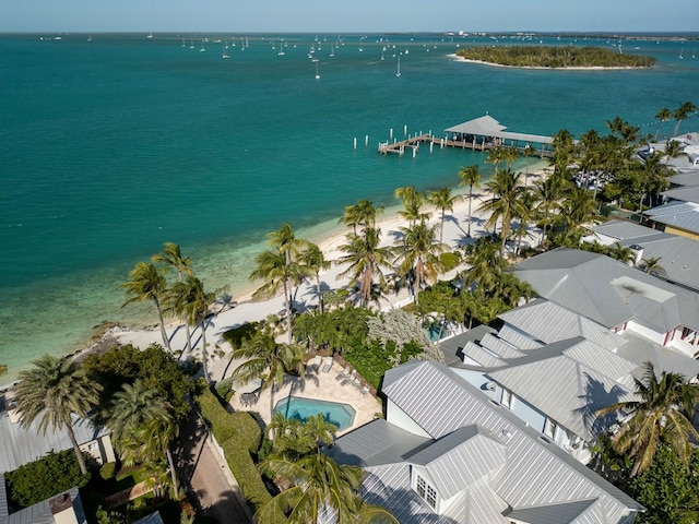 aerial view with a water view and a view of the beach