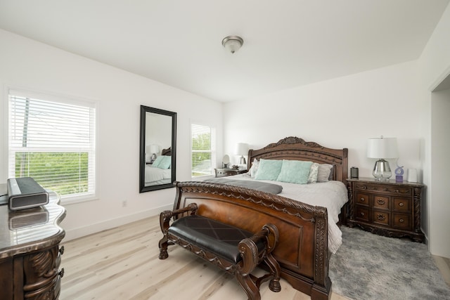 bedroom with light hardwood / wood-style floors