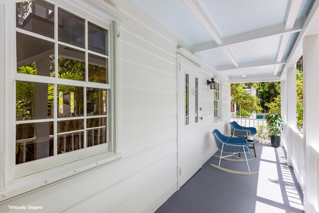 view of patio featuring a porch