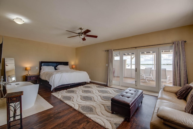 bedroom featuring access to exterior, dark wood-type flooring, french doors, and ceiling fan