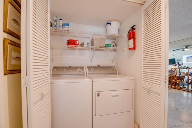1901 S Roosevelt Blvd Unit 404S, Key West, FL 33040 - laundry area featuring light tile patterned floors, a ceiling fan, laundry area, and washing machine and dryer
