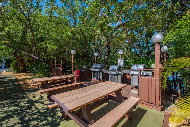 1901 S Roosevelt Blvd Unit 404S, Key West, FL 33040 - view of property's community with a patio, an outdoor kitchen, and outdoor dining space