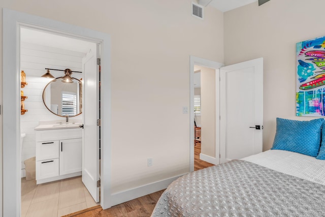 273 Indies Rd, Ramrod, FL 33042 - bedroom with light wood finished floors and ensuite bath