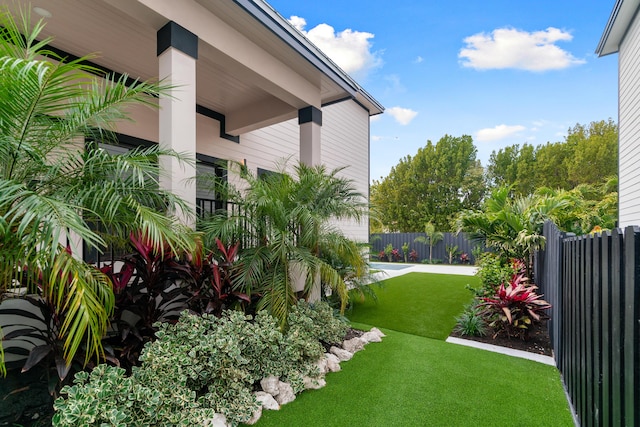 view of yard with fence