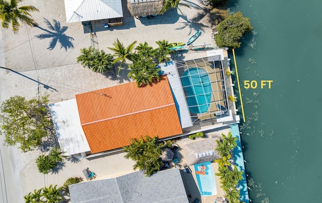 bird's eye view with a water view