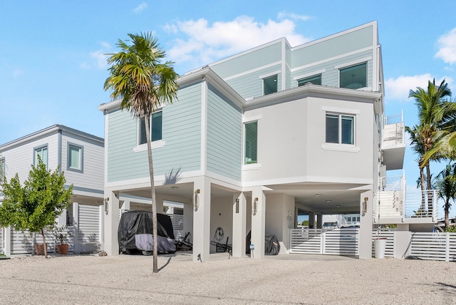 view of front of property with a carport