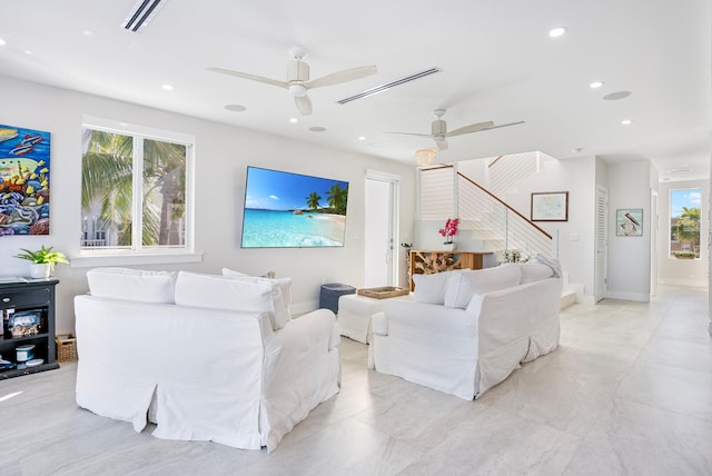 living room with ceiling fan