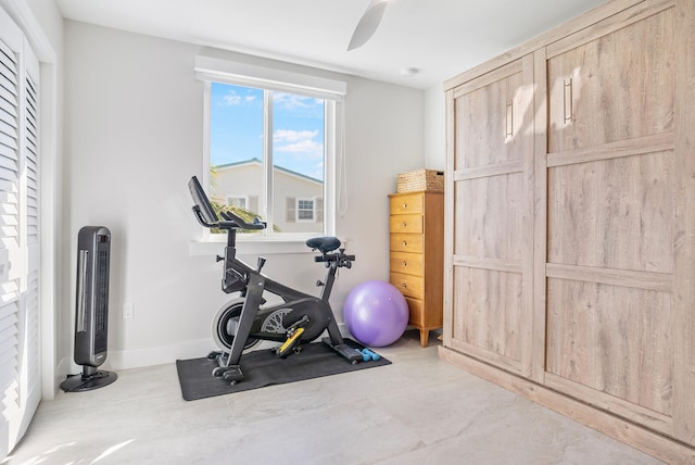 exercise area with ceiling fan