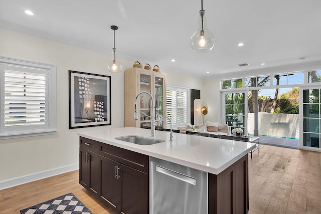 205 Virginia St, Key West, FL 33040 - kitchen featuring dishwasher, light wood-style floors, dark brown cabinetry, hanging light fixtures, and recessed lighting