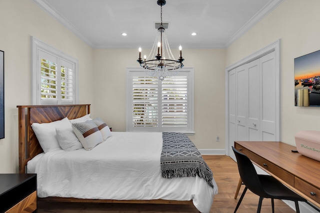 205 Virginia St, Key West, FL 33040 - bedroom with a chandelier, wood finished floors, crown molding, a closet, and recessed lighting