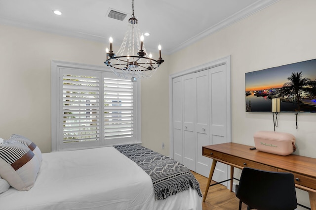 205 Virginia St, Key West, FL 33040 - bedroom featuring a chandelier, ornamental molding, a closet, wood finished floors, and recessed lighting