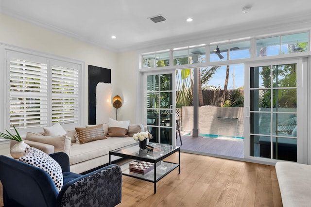 205 Virginia St, Key West, FL 33040 - living area with crown molding, light wood-style floors, and recessed lighting
