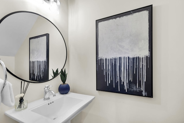 205 Virginia St, Key West, FL 33040 - bathroom featuring a sink and vaulted ceiling