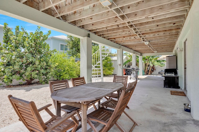 view of patio with a grill