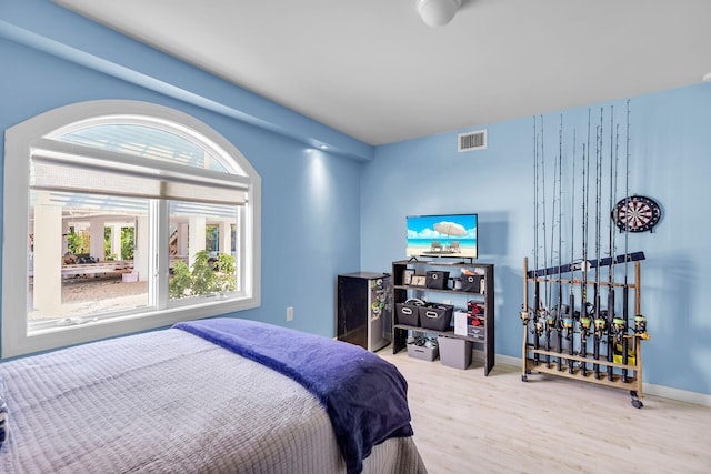 bedroom featuring hardwood / wood-style flooring