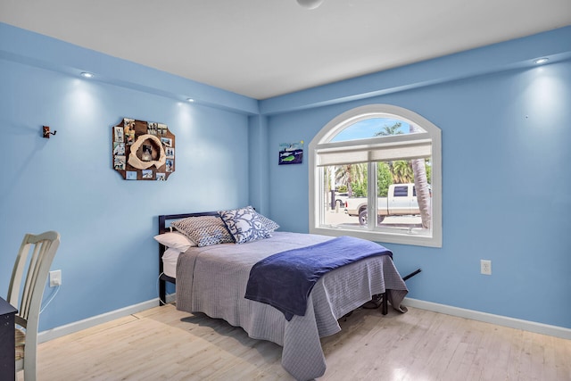 bedroom featuring light wood-type flooring