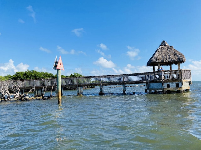view of dock with a water view