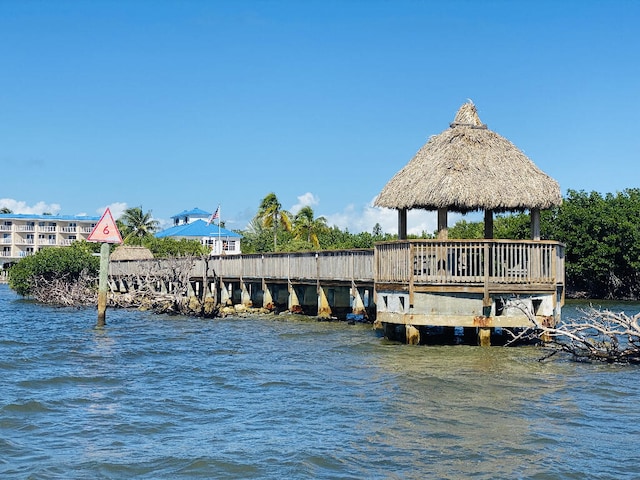 dock area featuring a gazebo and a water view