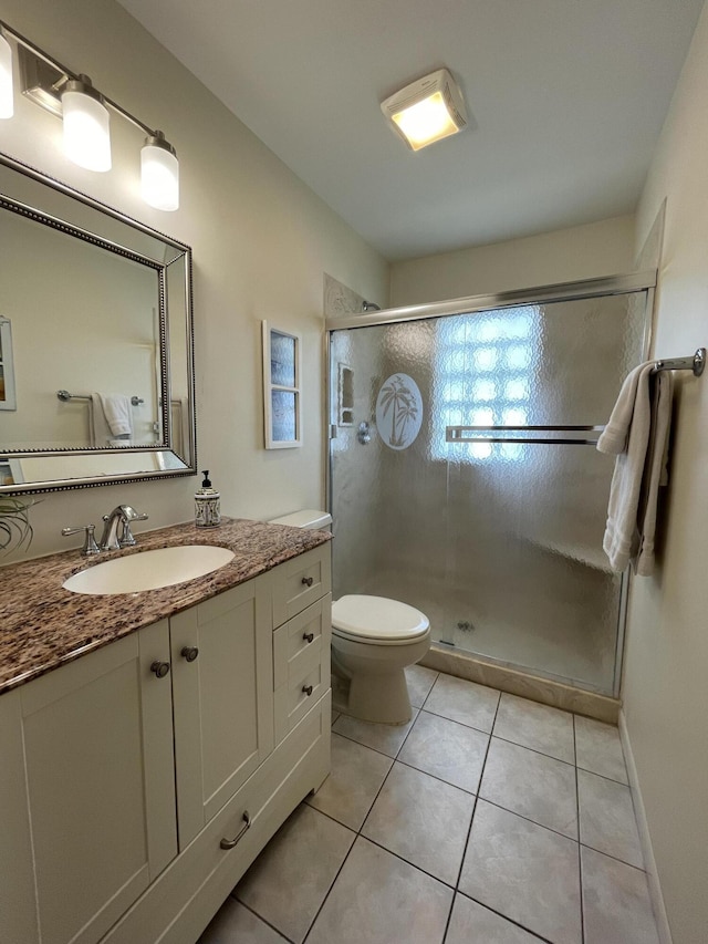 1165 Lagoon Dr, Summerland, FL 33042 - full bath with a shower stall, tile patterned floors, vanity, and toilet