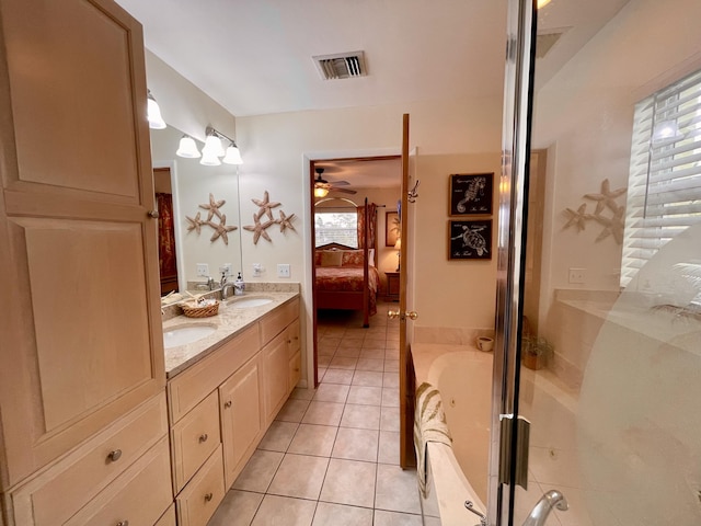 1165 Lagoon Dr, Summerland, FL 33042 - ensuite bathroom with tile patterned floors, a ceiling fan, a garden tub, double vanity, and a stall shower