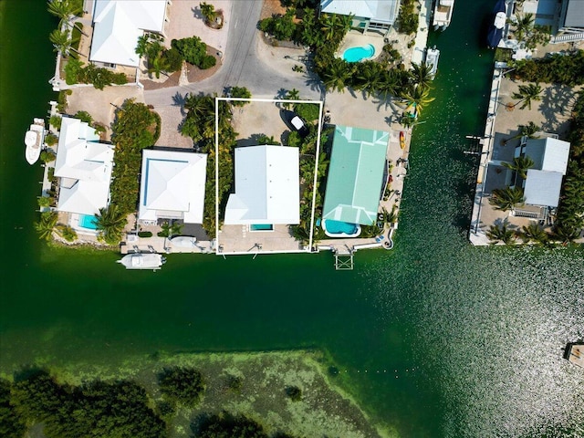 1165 Lagoon Dr, Summerland, FL 33042 - aerial perspective of suburban area featuring property parcel outlined and a nearby body of water