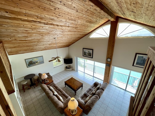 1165 Lagoon Dr, Summerland, FL 33042 - living area with wood ceiling, tile patterned flooring, high vaulted ceiling, and plenty of natural light