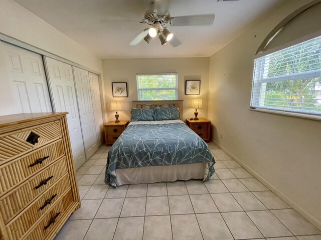 1165 Lagoon Dr, Summerland, FL 33042 - bedroom with a closet, light tile patterned floors, and a ceiling fan