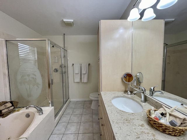 1165 Lagoon Dr, Summerland, FL 33042 - full bathroom with tile patterned flooring, a shower stall, vanity, a garden tub, and toilet