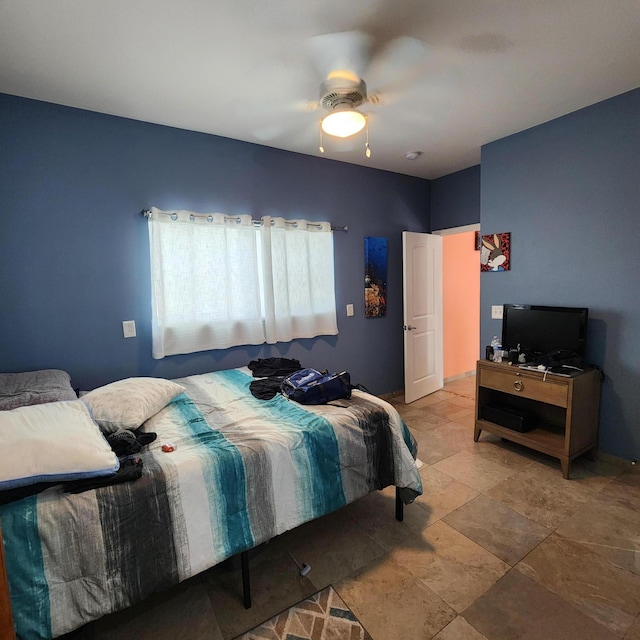 bedroom featuring ceiling fan