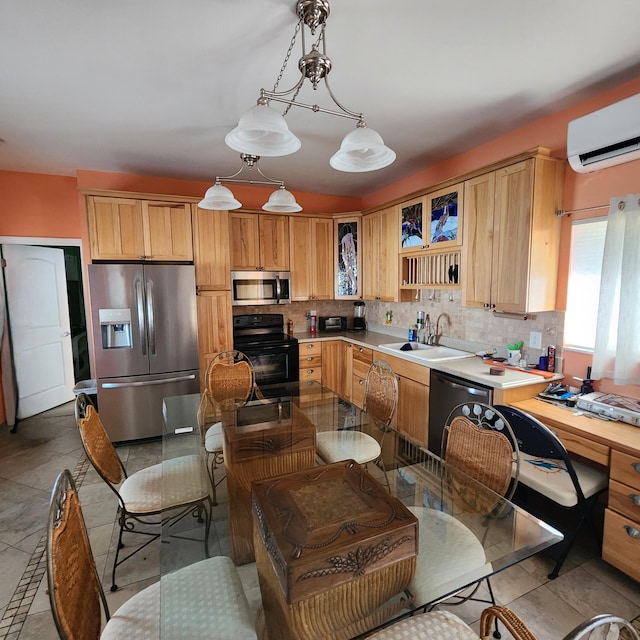 kitchen featuring sink, hanging light fixtures, stainless steel appliances, a wall mounted AC, and decorative backsplash