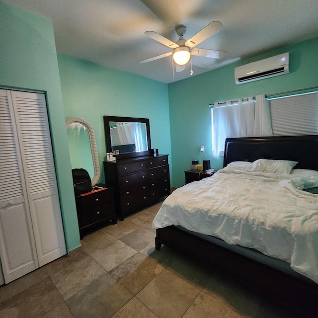 bedroom featuring ceiling fan and a wall mounted AC