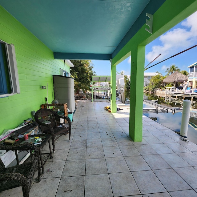 view of patio / terrace with a dock