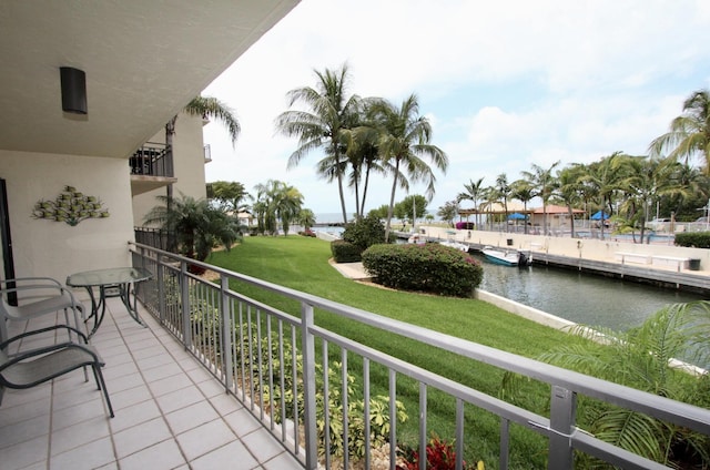 balcony featuring a water view