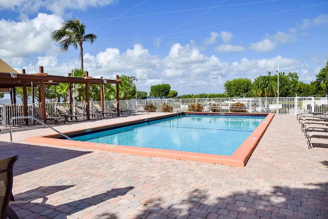 view of swimming pool featuring a patio