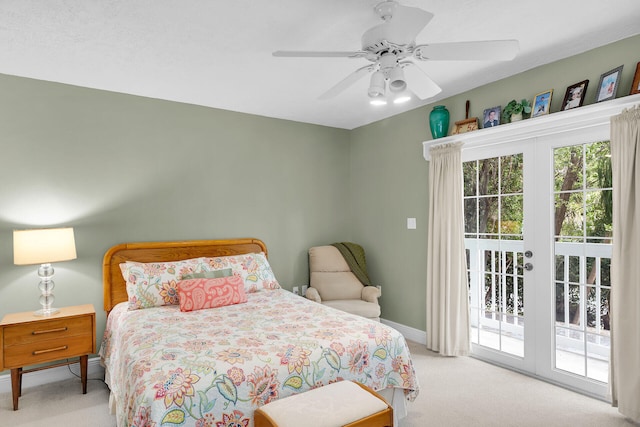 bedroom with light carpet, access to exterior, multiple windows, and ceiling fan