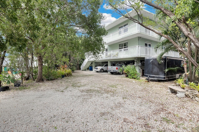 exterior space with a carport