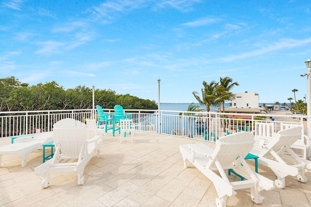 view of patio / terrace featuring a water view