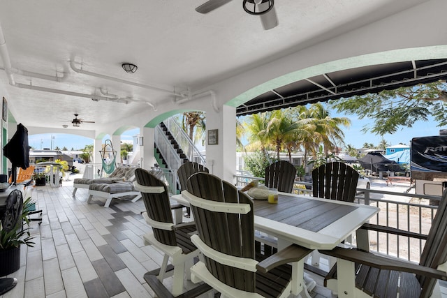 view of patio featuring ceiling fan